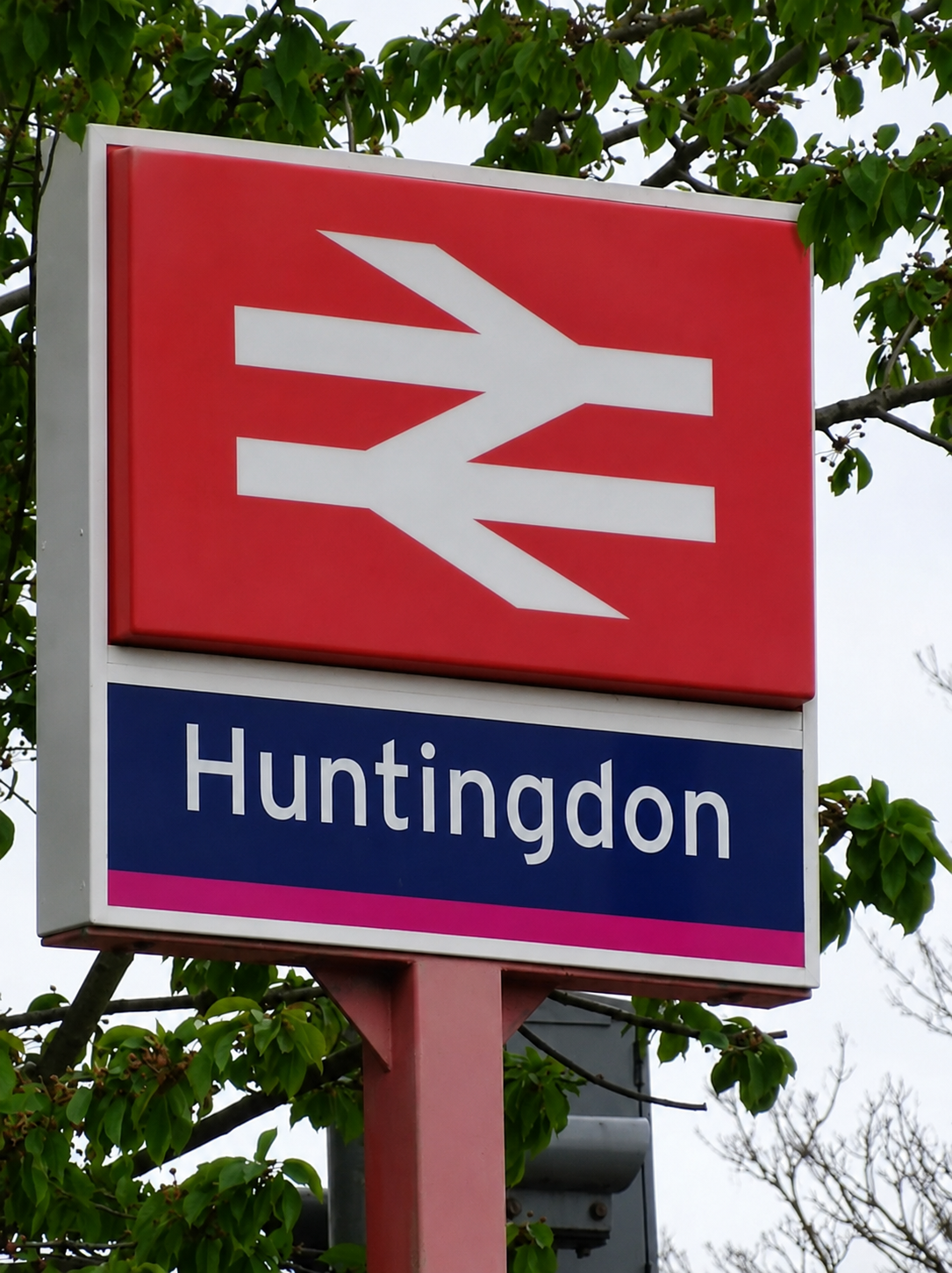 Huntingdon Train Station sign used for private hire taxi and station transfer services by Huntingdon Taxis.