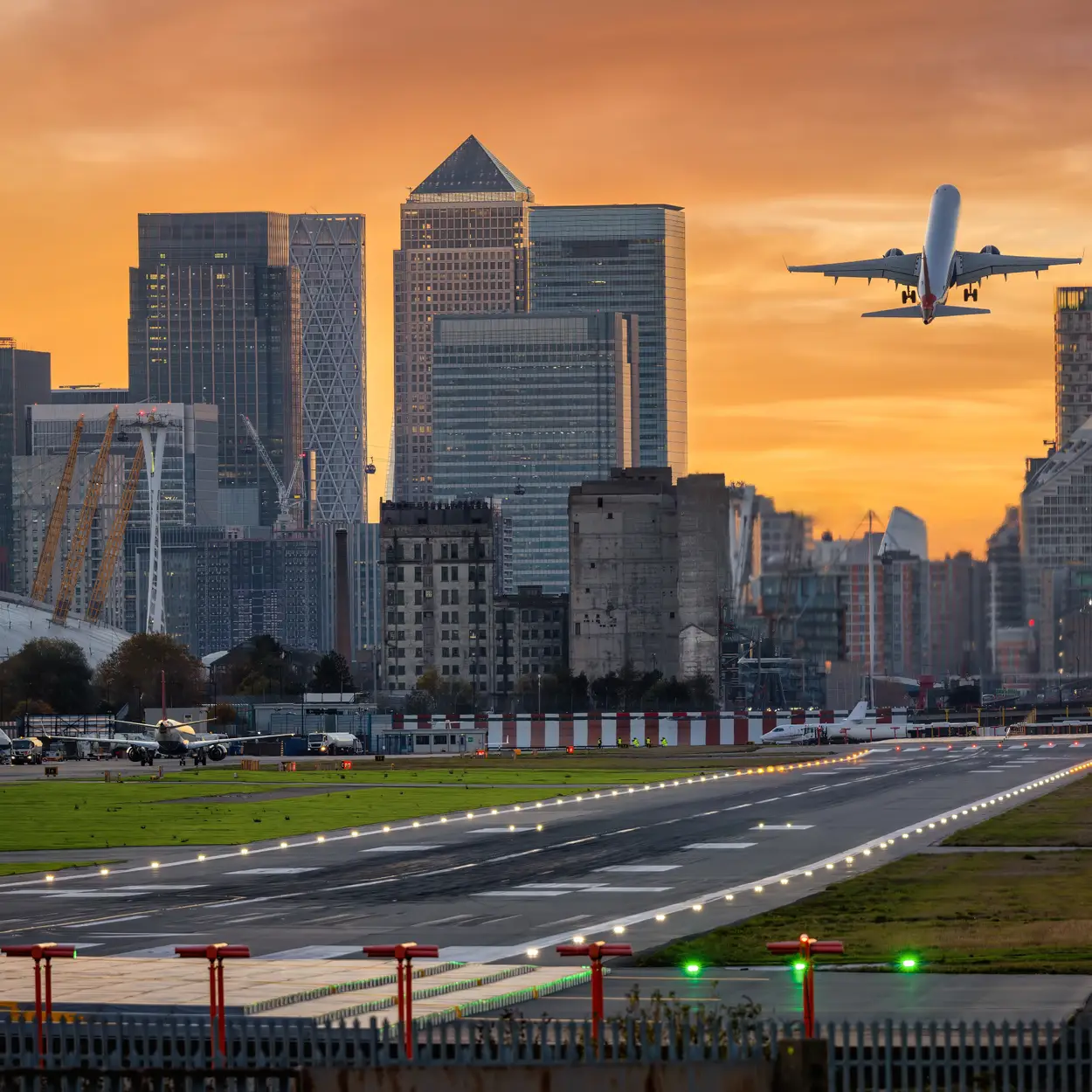 London City Airport skyline with aircraft for airport transfers from Huntingdon
